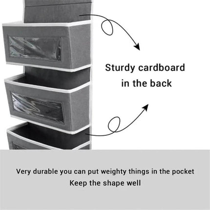 Wall-Mounted Fabric Storage Bag For Wardrobe Doors Gray 4-Grids hanging on door showing sturdy cardboard back and clear front pockets for shoes and accessories