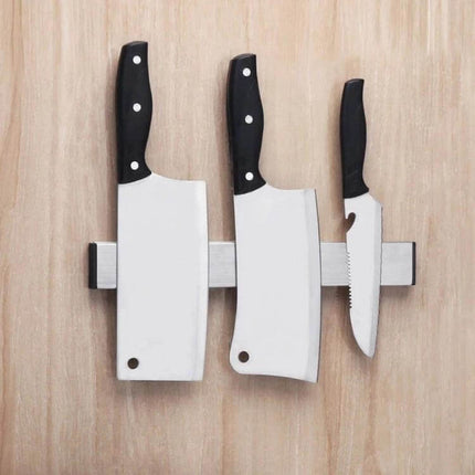 Wall Mounted Magnetic Knife Holder For Kitchen Use showing three knives on SUS304 stainless steel bar with 3M adhesive, compact 31x4x1.5cm profile