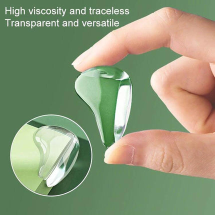 Water Drop Transparent Silicone Corner Guards For Kids 10 Pack - clear water‑drop silicone corner protector shown between fingers, high viscosity adhesive, discreet edge safety