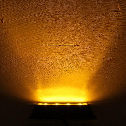 Waterproof Car Strobe Light Emergency Warning Lamp mounted on vehicle emitting bright amber beam on wet road surface for 12V roadside visibility