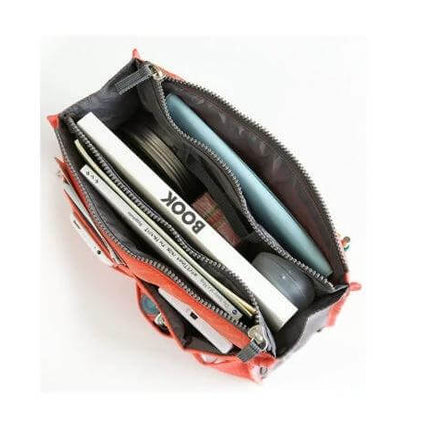 Waterproof Folding Travel Bag Large Capacity for Sundries showing organized toiletries, cosmetics and cables inside with double zipper and waterproof fabric