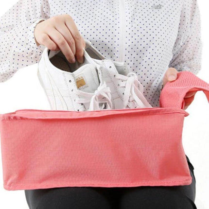 Waterproof Shoes Bag Organizer 30x21x11 cm Travel Pouch holding white sneakers in pink nylon travel shoe pouch