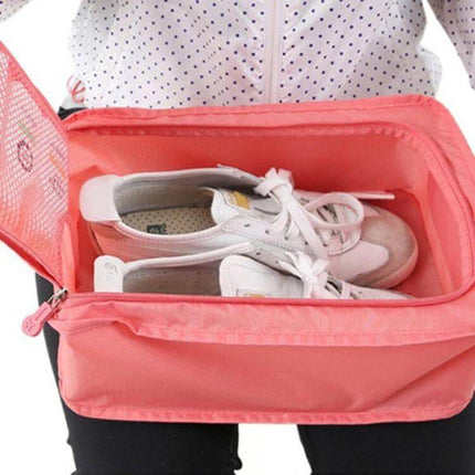 Waterproof Shoes Bag Organizer 30x21x11 cm Travel Pouch showing white sneakers inside a coral nylon travel shoe organizer, water-repellent zipper pouch