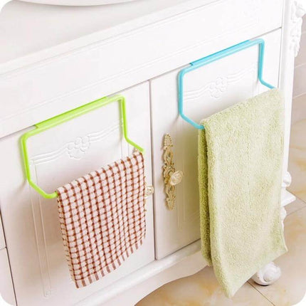 White Cabinet Door Towel Rack for Kitchen and Bath hanging on cabinet holding two towels, tool-free hook-on design