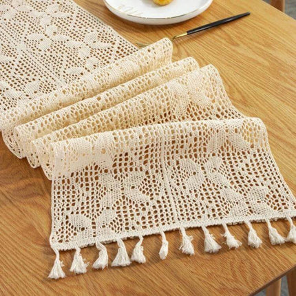 Widened and Stitched Rustic Knitted Hollow Table Runner 30x300 cm on wooden table showing crochet texture and tassel edging