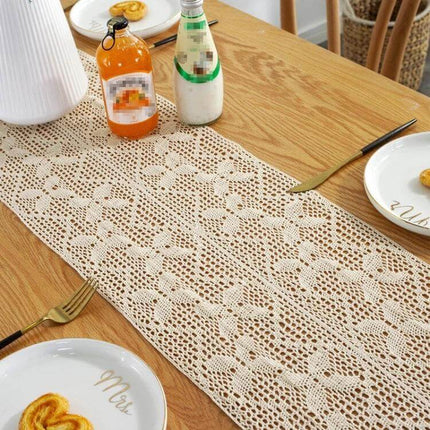 Widened and Stitched Rustic Knitted Hollow Table Runner 30x300 cm on wooden dining table with plates and bottles