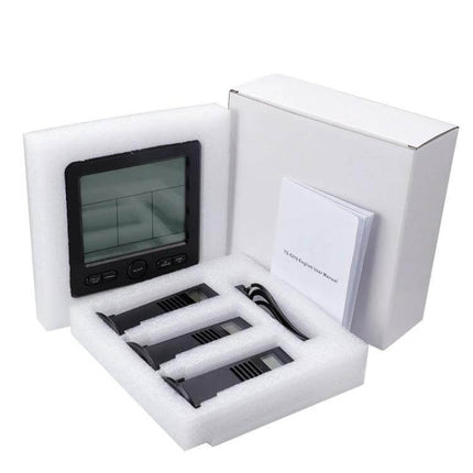 Wireless Thermometer And Hygrometer With Color Alarm desktop host and three outdoor sensors kit in packaging showing display, buttons, cables and manual
