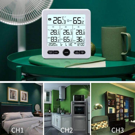 Wireless Thermometer And Hygrometer With Color Alarm showing indoor host unit on table and three room sensor channels CH1 CH2 CH3