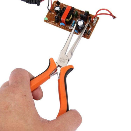 WLXY 4.5-Inch Needle-Nose Pliers For Electronics Repair — hand holding pliers gripping component on circuit board for precision electronics work