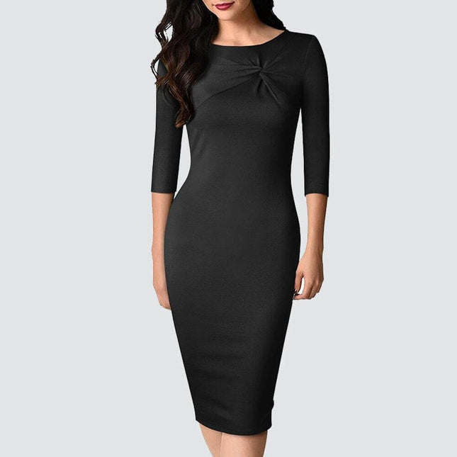 Women's Office Sheath Dress High Waist Pencil Skirt in black mid-length sheath with high waist, side zipper and subtle pleating, styled for office layering