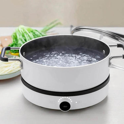 Xiaomi Mijia 4L Stockpot For Everyday Cooking white aluminum stockpot on induction cooker boiling water, 4L capacity for soups and stews