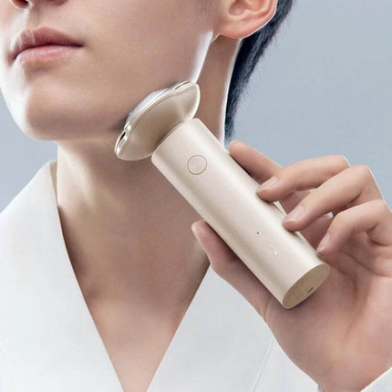 Xiaomi Electric Shaver Grey For Daily Home Grooming - compact grey shaver used on jawline for quick precise home grooming