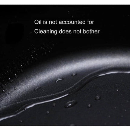 Xiaomi Mijia 4L Stockpot For Everyday Cooking close-up of nonstick inner surface with water droplets showing easy cleaning and even heat distribution