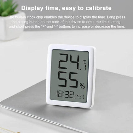 Xiaomi Youpin Miaomiaoce LCD Hygrometer to Monitor Indoor Humidity compact LCD display showing 24.1°C and 55% humidity, desk or wall use