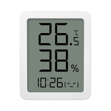 Xiaomi Youpin Miaomiaoce LCD Hygrometer to Monitor Indoor Humidity showing 26.5°C, 38% RH and digital clock on white LCD display