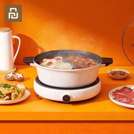 Xiaomi Zhiwu Soup Pot 4L For Everyday Soups And Meals white 4L pot on electric cooker steaming hot soup for family portions