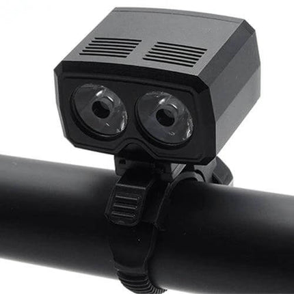 Y15 USB Charging Bike Headlight DualLED With 5 Modes mounted on bike handlebar, dual CREE XPG2 LEDs and USB recharge visible