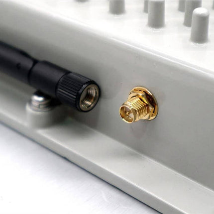 Industrial UHF RFID Long Range Reader with WiFi Communication showing antenna connector and SMA port for warehouse asset tracking