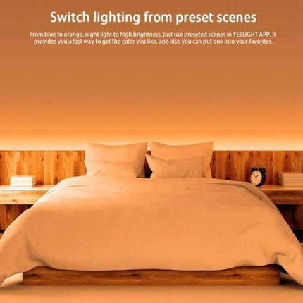 Yeelight Smart WiFi LED Strip Light 1m Extension Remote Control installed behind bedroom headboard showing warm preset scene