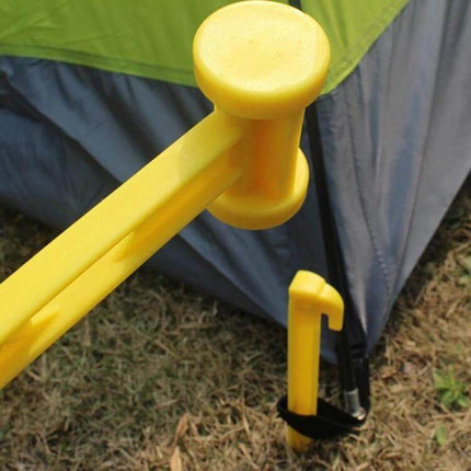 Yellow Plastic Tent Hammer For Camping Everyday Use - lightweight 25cm yellow plastic hammer driving tent stake into grass near tent