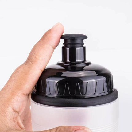 ZTTO 750ml Cycling Water Bottle For Outdoor Riding - close-up of black push-pull cap and silicone seal, fits standard bottle cages