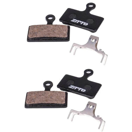ZTTO Bicycle Disc Braking Pads For Mountain Bike Everyday Use - pair of copper fiber resin brake pads with steel backing plates and springs