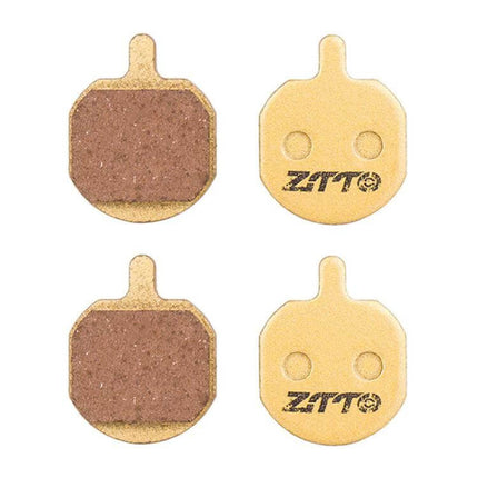 ZTTO Mountain Bike Brake Pads Full Metal Copper Base shown as four copper-backed disc brake pads for reliable, quiet braking in wet dusty trails