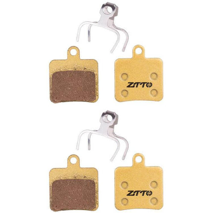 ZTTO Mountain Bike Brake Pads Full Metal Copper Base front and back view showing copper backing and friction material, quiet durable trail performance
