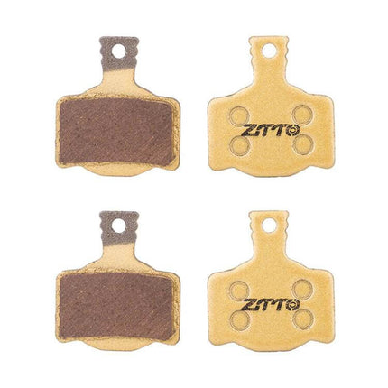 ZTTO Mountain Bike Brake Pads Full Metal Copper Base shown as four copper-backed brake pads for mountain and urban riding