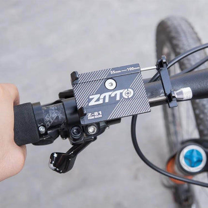 ZTTO Mountain Bike Phone Holder Adjustable 50 To 100mm mounted on aluminum alloy handlebar for secure phone navigation