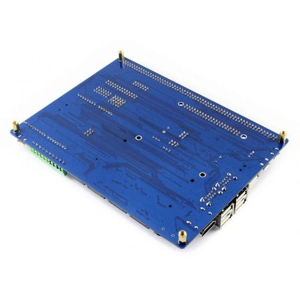 Waveshare Compute Module IO Board Plus for Raspberry Pi Use blue expansion board angled view with USB ports and pin headers
