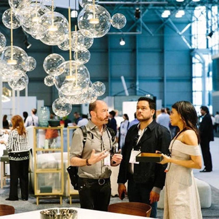 Stylish Glass Ball Chandelier for Everyday Home Lighting hanging above showroom conversation, glass shades with metal body