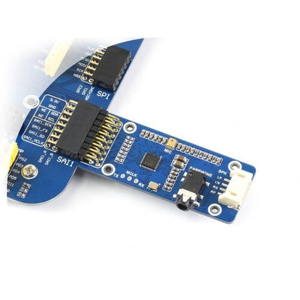 Waveshare Stereo Audio Module for Music Playback and Recording close-up showing WM8960 chip, audio jack, and connector on blue PCB