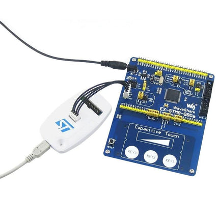 Waveshare ST-LINK/V2 Programmer for STM8 and STM32 Devices connected via USB to a blue STM development board for in-circuit debugging and programming