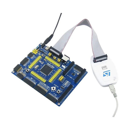 Waveshare ST-LINK/V2 Programmer for STM8 and STM32 Devices connected via USB to an STM32 development board using SWD/JTAG ribbon cable