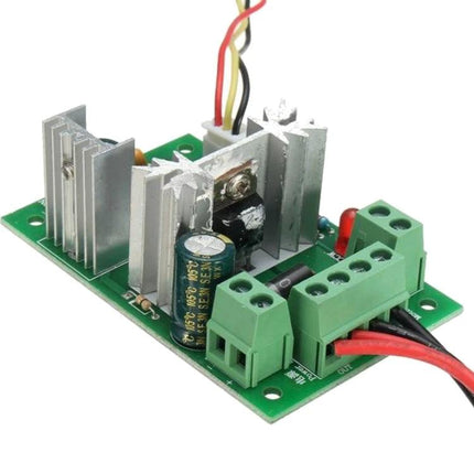 DC Motor Speed Controller with Reversible Switch for PWM Adjustment mounted on green PCB showing heatsinks, terminal blocks and wiring for hobby electronics