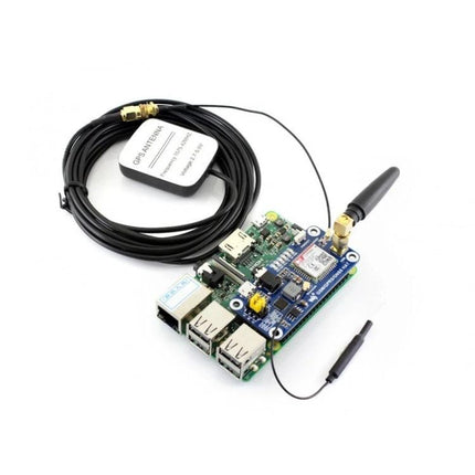 Waveshare Raspberry Pi HAT for Wireless Connectivity mounted on Raspberry Pi with SIM868 module, GPS antenna and cellular/Bluetooth antenna