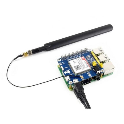 Waveshare 4G/3G HAT for Raspberry Pi Connectivity in Europe and Asia - Raspberry Pi mounted SIM7600E-H module with antenna for IoT, GPS, data and SMS