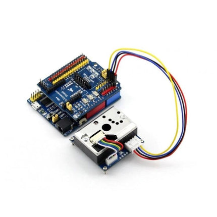 Waveshare Dust Sensor for Detecting Fine Airborne Particles connected to microcontroller board with colored wires for PM2.5 monitoring