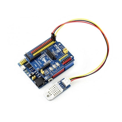 Waveshare DHT22 Sensor for Ambient Temperature and Humidity Monitoring connected to microcontroller board with jumper cable