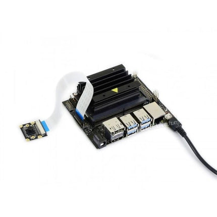 Waveshare Wide-Angle 120-Degree Camera for Jetson Nano Projects connected to Jetson Nano board showing ribbon cable and USB ports