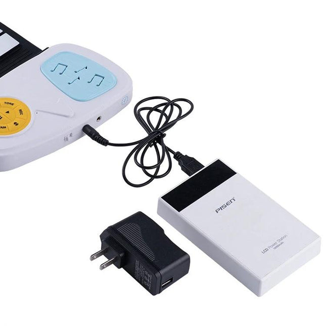 Colorful Silicone Electronic Piano for Children's Daily Music Practice showing roll-up piano connected to portable power bank and charger