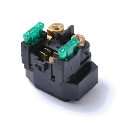 Yamaha Starter Relay Solenoid Kit With Fuses For Motorcycles shown with copper relay, two green blade fuses and brass terminals for motorcycle starter circuit replacement