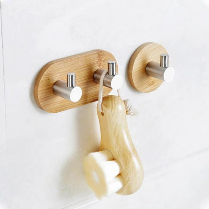 Door Hook Adhesive Two Pack For Kitchen And Bathroom - stainless steel and bamboo hooks mounted on wall holding bath brush, rust-resistant adhesive mounts