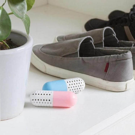Alloet Shoe Deodorizer Capsules For Shoes And Closet Freshness - compact pink and blue deodorizer capsules beside casual shoes keeping closet and shoe cabinet fresh