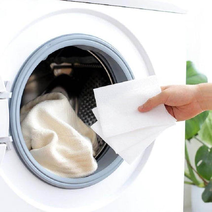 Anti Cross Dye Color Absorption Film Pack Of 5 Boxes For Clothes shown as laundry sheets placed into washing machine to prevent dye transfer