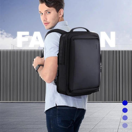 Laptop Backpack for Work With Anti-Theft Pocket for Daily Commutes worn by a commuter with anti-theft back pocket and USB charging port