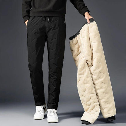 Men's Comfortable Padded Cotton Blend Trousers for Daily Use model wearing black padded trousers holding beige lining