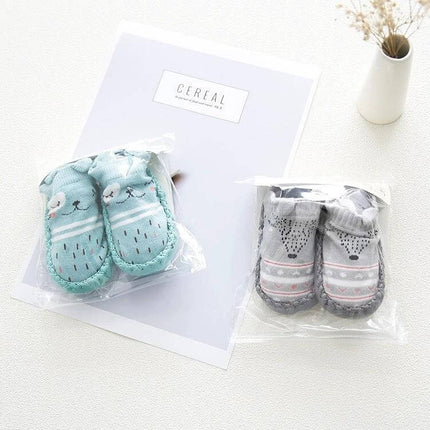 Baby Floor Socks With Non Slip Soles For Daily Comfort - pastel blue and gray combed cotton jacquard non-slip baby floor socks in clear packaging