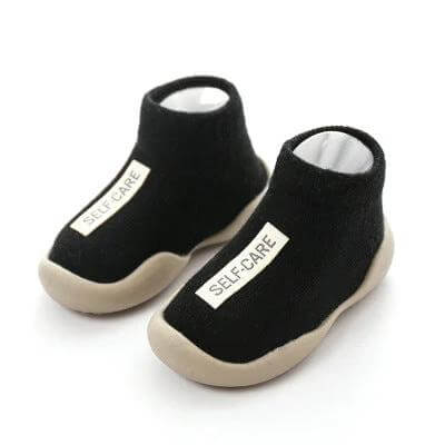 Baby Toddler Combed Cotton Floor Socks Breathable Cute black mesh ankle bootie floor socks with non-slip sole and "SELF-CARE" label